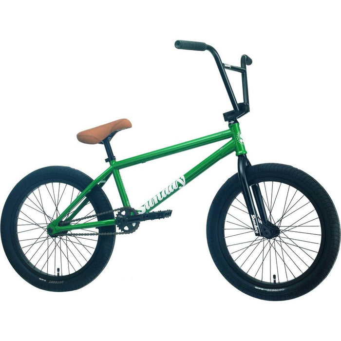 Green Sunday Forecaster BMX bike with brown seat and black tires and handlebars