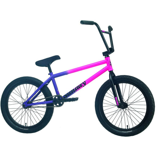 Sunday Street Sweeper BMX bike in matte hot pink to matte grape fade with black handlebars and tires designed for street riding.