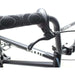 Close-up of black handlebar and brake lever on Verde Cadet 18 BMX bike for young riders