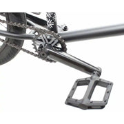 Close-up of black chromoly crank and nylon composite pedal on Verde Cadet 18 BMX bike for kids