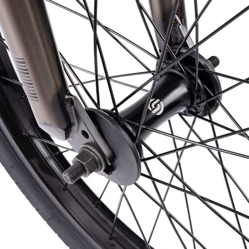 Close-up of the front wheel hub and spokes on the Wethepeople Justice Bike with a black 22mm offset fork and hub guard.