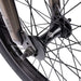 Close-up of the front wheel hub and spokes on the Wethepeople Justice Bike with a black 22mm offset fork and hub guard.