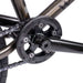 Close-up of the Wethepeople Justice bike crankset with Paragon plastic guard and chain in black finish