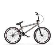 WETHEPEOPLE NOVA 20" BMX bike with 12.75" chainstay, 26mm offset fork, and salt components in black and bronze finish