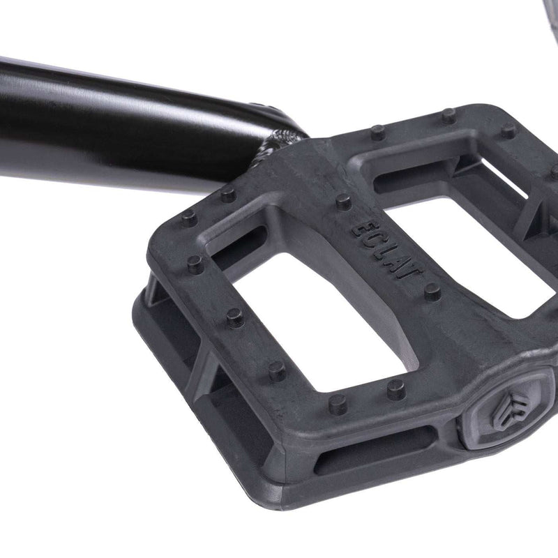 BMX bike pedal on the WETHEPEOPLE TRUST CS, featuring durable nylon/fiberglass construction.