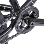 Close-up of the WETHEPEOPLE TRUST CS bike's paragon plastic guard sprocket and chain system.