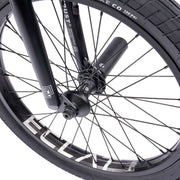 Close-up of WETHEPEOPLE TRUST CS bike wheel featuring éclat hub and activate tire.