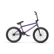 Purple WETHEPEOPLE TRUST FC BMX bike with black tires and handlebars, street upgrade design.