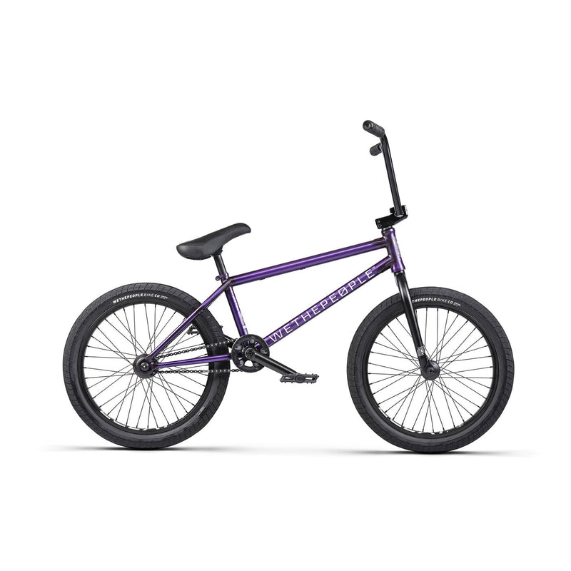 Purple WETHEPEOPLE TRUST FC BMX bike with black tires and handlebars, street upgrade design.